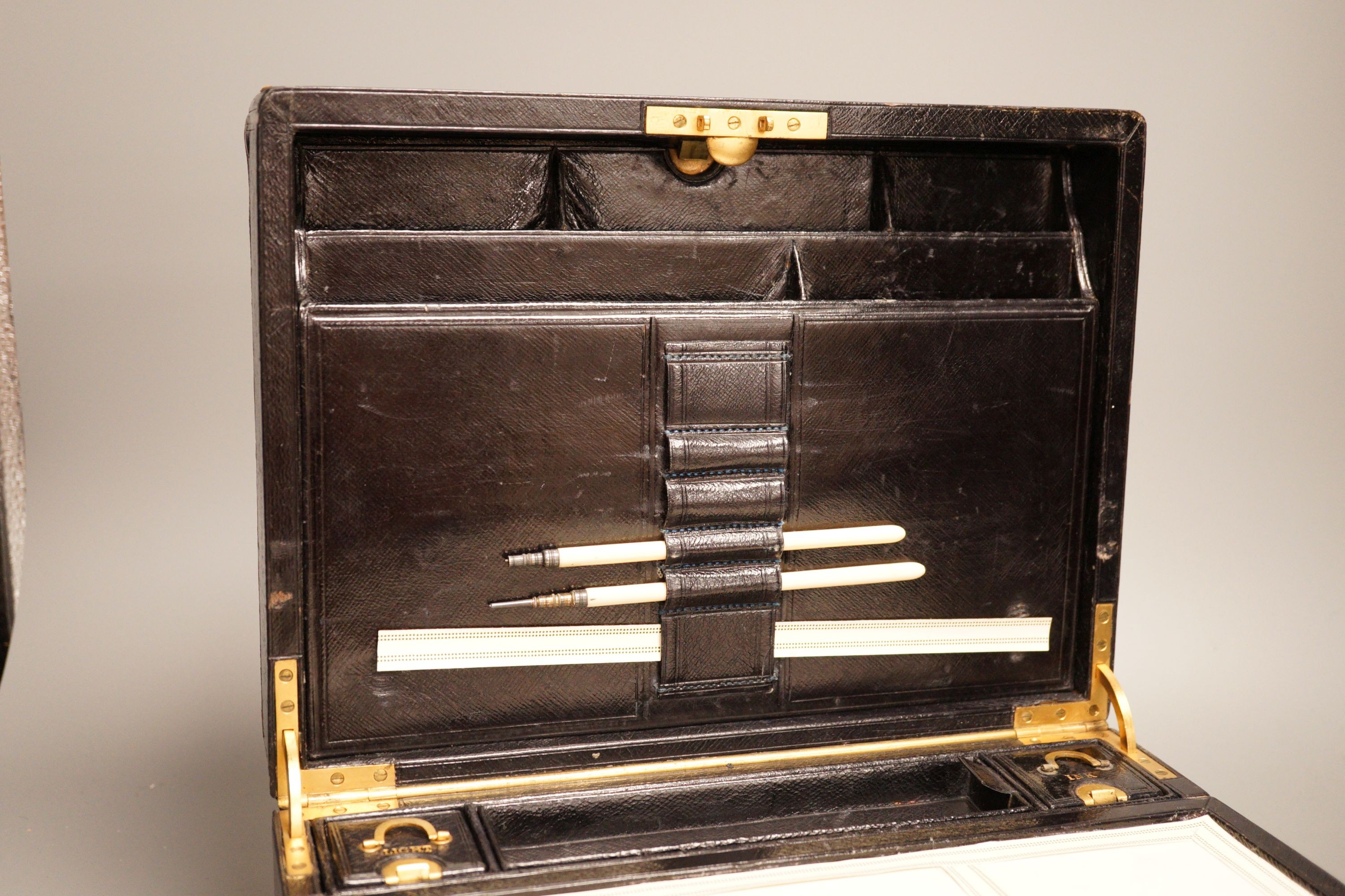 An Asprey & Son Morocco leather clad travelling writing box, 31 cm wide